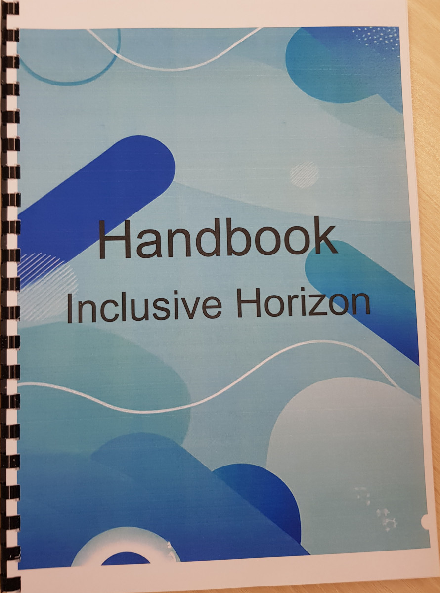 Spiral-bound cover with the text "Handbook 'Inclusive Horizon'" in black on a light blue background, featuring dark blue abstract shapes and white wavy lines.
